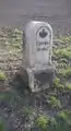 restaurierter Abzweigstein an der B 101, Abzweig Falkenbach