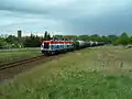 212 279-4 und 212 314-9 bei der Ausfahrt mit einem Güterzug in Richtung Wustermark