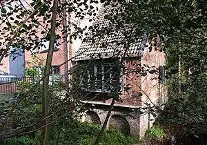 Mühlengebäude mit Radhaus