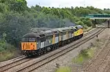 56 301 und 56 302 hinter einer Class 47 in North Wingfield (2010)
