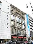 Das ursprüngliche Gründergebäude an der Stiftgasse 3, die Aufschrift ist oben in Gold noch zu erkennen