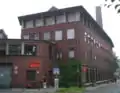 Schornstein und Reste der Nellessenschen Tuchmanufaktur. Heute Probebühne des Aachener Stadttheaters.