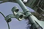 Detail: linkes Bandende mit der Inschrift Lucem Demonstrat Umbra
