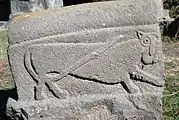 Christlicher Grabstein beim Mausoleum mit einem archaischen Löwenrelief