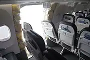 Die Rumpföffnung in der Flugzeughülle von innen: An dieser Stelle befand sich der Notausstiegsverschluss und ein Teil der Kabinenverkleidung