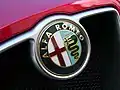Biscione im Logo des in Mailand gegründeten Automobilherstellers Alfa Romeo