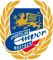 Emblem in der Zeit zwischen 1964 und dem 28. Dezember 1965. Es ähnelt dem Vorgängeremblem. Im Logo ist erneut der Rostocker Greif zu sehen.