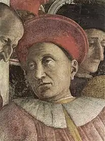 Ein sehr seltenes Beispiel eines echten Kragens im 15. Jahrhundert. (Andrea Mantegna: Ludovico II. Gonzaga, Camera degli sposi, Mantua, 1474)