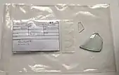 Glasfragment in Fundverpackungstüte