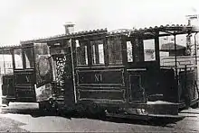 Meterspuriger Serpollet-Dampftriebwagen mit geöffnetem Türen und dadurch sichtbaren Kessel der Société genevoise des chemins de fer à voie étroite, einer Überlandstrassenbahn bei Genf, 1889