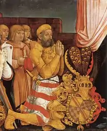 Christoph I. auf der Mark­grafen­tafel. Das gevierte Wappen zeigt neben dem badischen Schräg­balken das rot-silberne Schach­brett der hinteren Grafschaft Sponheim. Als Helmzier dienen Stein­bock­hörner und Pfauen­federn, das Wappen ist umgeben vom Orden vom Goldenen Vlies.