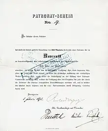 Patronat-Schein zur Finanzierung der Festspiele in Bayreuth. Der am 1. Februar 1872 aufgelegte Patronat-Schein wurde von Richard Wagner und drei Bevollmächtigten und Verwaltern im Original signiert, u. a. von dem Bankier Friedrich Feustel. Durch Zahlung von 300 Thaler erwarb der Inhaber des Scheins „die Rechte eines Patrones der in Bayreuth zu bewerkstelligenden drei vollständigen Aufführungen des Bühnenspieles Der Ring des Nibelungen“.