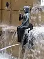 Weltkugelbrunnen, Bronzefigur Die Eitelkeit&nbsp;