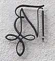 Zirkel an der Corpshauswand