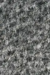 Punktgespitzte Steinoberfläche (Beuchaer Granitporphyr),(Muster ca. 25 × 15&nbsp;cm)