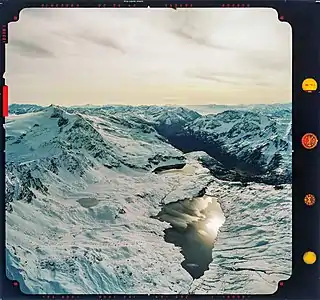 Zur Bocchetta geht es zwischen den beiden kleinen Seen links hoch. Hinter der Bocchetta erhebt sich der Basòdino mit dem  gleichnamigen Gletscher.