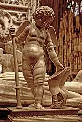 Putto auf dem Grabmal Philiberts des Schönen