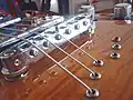 Tune-O-Matic ohne Stopbar (strings through body)