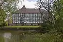 Fachwerk der Burg hinter dem westlichen Wassergraben
