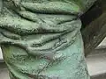 Rechter Oberschenkel mit liegender Figur