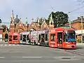 Bombardier Cityrunner 659 mit Werbung für Jochen Rindt beim Zentralfriedhof.
