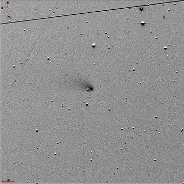 Negativbild des Kometen vom 22. Dezember 2022 mit einer scheinbaren Helligkeit von 8m von Asiago aus (Osservatorio Astrofisico di Asiago).