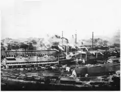 Fabrik- mit Gleisanlagen (aus: L’Homme et la Terre, Die Menschen und die Erde, Band 5, Élisée Reclus, ca. 1900)