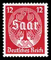 Briefmarke des Deutschen Reiches aus dem Jahr 1934 zur Vorbereitung der Saarabstimmung: Reichsadler vor aufgehender Hakenkreuz-Sonne mit der Aufschrift Saar