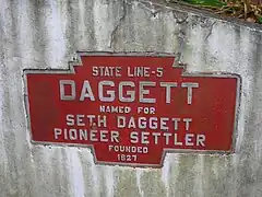 Keystone Marker für Daggett in eine Mauer einzementiert
