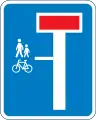 E18.1.3: Sackgasse mit einer für Fußgänger und Radfahrer durchgängigen Straße links