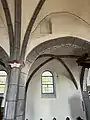 Zugemauertes Rundbogenfenster aus romanischer Zeit
