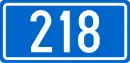 D218