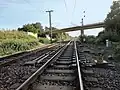 EW 60-6000/​3700-1:32,5 in der Rhein­tal­bahn, Ver­bin­dungs­kur­ve Ub­stadt, Ab­zweig von Hei­del­berg zur Schnell­fahr­strecke Rich­tung Stutt­gart (in Betrieb seit 1988)