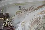 Engelsputten am Chorbogen