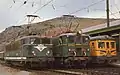 Französische BB 8500 neben spanischer Baureihe&nbsp;1000 und RENFE-Triebwagen Baureihe&nbsp;438 in Latour-de-Carol, 1985