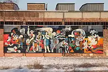Emailliertes Wandbild Internationale Solidarität in der Nähe des Bahnhofs in Thale/Harz