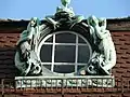 Dachfenster mit Meerjungfrauen
