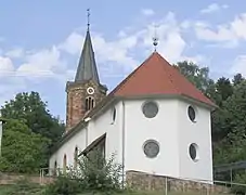 Saarbrücken-Scheidt: Neoromanischer Chorturm auf barockem Chor, Schiff 1957/58 verlängert