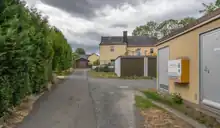 Das Foto zeigt von der Vogelherder Straße über den Feuersteig den Bereich des Vogelheerd