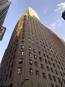 Angefaste Ecke am Broadway und der Wall Street