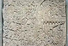 Belagerung einer Stadt. Dass hier der Tod Simons von Montfort dargestellt sei, lässt sich nicht belegen.