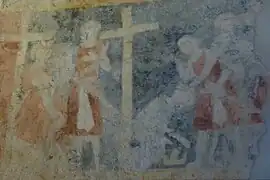 Heraklius legt seine Krone ab, um das Kreuz in die Stadt tragen zu können.