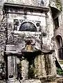 Die Funtana du Peshcaru (Brunnen der Puppe) zu Augurato