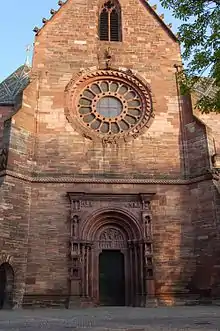 Basler Münster, Radfenster über der Gallus­pforte, um 1200 mit Eichen­speichen, erst im 19.&nbsp;Jh.  durch steinerne ersetzt