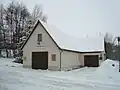 Feuerwehrhaus der Freiwilligen Feuerwehr Zettweil im Zentrum des Dorfes