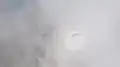 Glorie auf einer Wolke aus der Perspektive eines Gleitschirmpiloten