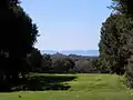 Blick von Abschlag 17 auf das Kastell von Punta Ala.