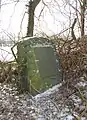 Grabstein auf der kleineren Insel