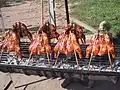 Gai Yang mit typischer Bambusstäbchen-Fixierung