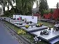 Gräber der Crew auf dem Powązki-Militärfriedhof